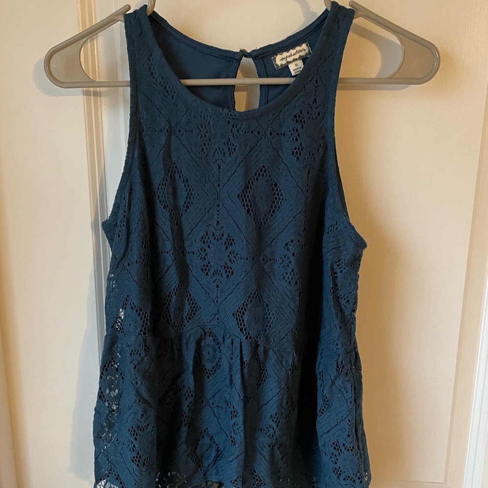 Blue Sleeveless Blouse with Flared Bottom
